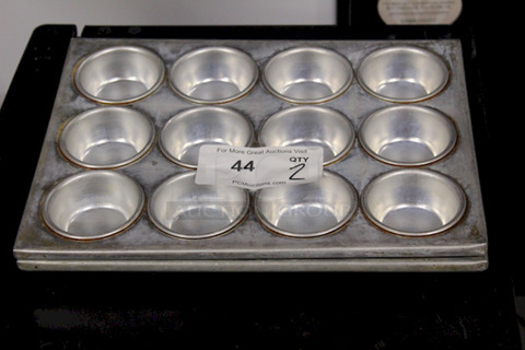 BEAUTIFUL! Large 12 Hole Muffin Pans. Muffin Hole Measurements 3”x1-1/4”. OA 14-1/8x10-3/4x1-1/4 2x Your Bid
