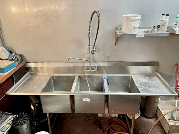AWESOME!! Regency 94" 16-Gauge Stainless Steel Three Compartment Commercial Sink with 2 Drainboards + Pre Wash Unit Bowl Dimensions - 18" x 24" x 14". Overall: 94x29-13/16x43-3/4 - Working Surface Height 36-1/2, Backspalsh Height - 7-1/4,  - Image 1 of 5