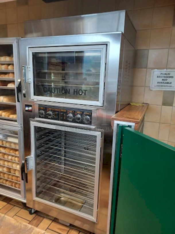 EXTREMELY WELL TAKEN CARE OF!! LIKE NEW! Nu-Vu® Model: Sub-123 Commercial Baking Oven and Proofer Combo Unit.
208v 3ph Oven/Proofer On Commercial Casters. Lighted Interior; Holds (3) Racks For Oven & (9) Racks For Proofer; (12) Racks Included;. 33½"H X 26"W X 20"D (Bottom Proofer). 3" Heavy Duty Lock-Able Casters; Lighted Interior;. (Nsf) & (Ul) Certified. 
Overall Condition and Functioning = 9/10 . 

Tested. Observed In Perfect Working Order.

Overall Dimensions:
36 1/8"x28 5/8"x77-3/4"

Proofer Interior:
Left to Right: 26 1/4" x Front to Back: 20 1/4" x Height: 33 1/2"

Oven Interior:
Left to Right: 26 1/4" x Front to Back: 20 1/4" x Height: 15"
 
 - Image 3 of 3