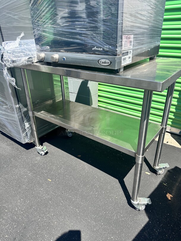Excellent Standard Mobile Stainless Steel Worktable with Bottom Shelf - 48 x 24 - Image 1 of 5