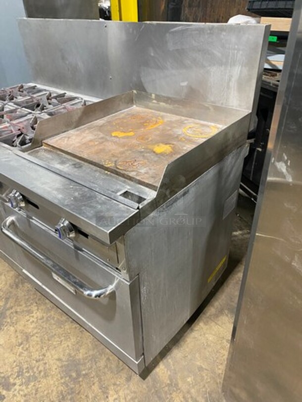 Patriot Commercial Natural Gas Powered 6 Burner Stove With Flat Griddle! Flat Griddle Has Side Splashes! With Raised Back Splash! With 2 Oven Underneath! Metal Oven Racks! All Stainless Steel! On Casters! WORKING WHEN REMOVED! - Image 2 of 12