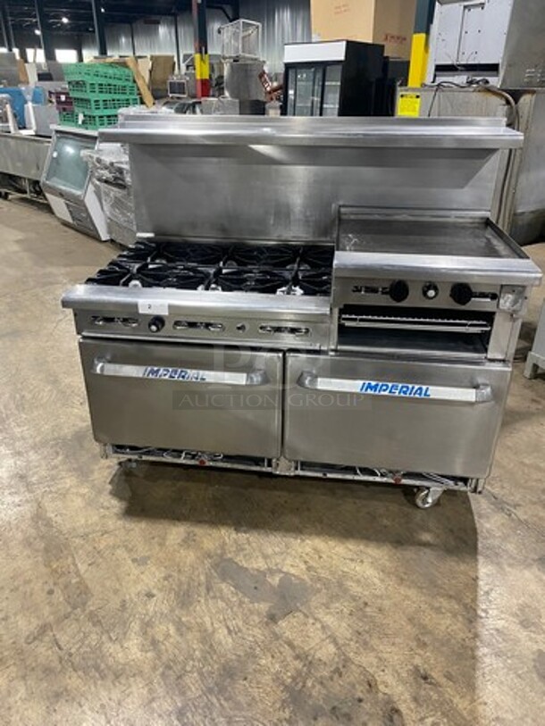 Imperial Commercial Natural Gas Powered 6 Burner Stove With Right Side Flat Griddle! Griddle Has Side Splashes! With Raised Back Splash And Salamander Shelf! With 2 Oven Underneath! Metal Oven Racks! All Stainless Steel! On Casters!