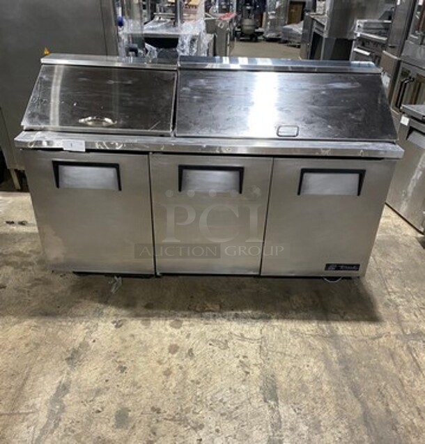 True Commercial Refrigerated Sandwich Prep Table! With 3 Door Storage Space Underneath! Poly Coated Racks! All Stainless Steel! On Casters! Model: TSSU7218 SN: 14477571 115V 60HZ 1 Phase
