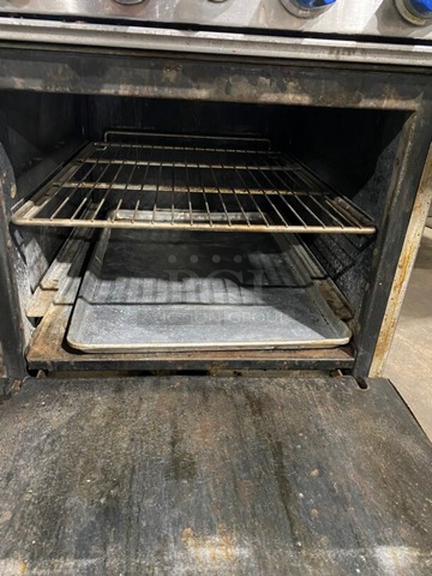 Imperial Commercial Natural Gas Powered 4 Burner Stove! With Raised Back Splash And Salamander Shelf! With Oven Underneath! All Stainless Steel! On Casters! WORKING WHEN REMOVED! Model: IR4 SN: 03273711 - Image 8 of 10