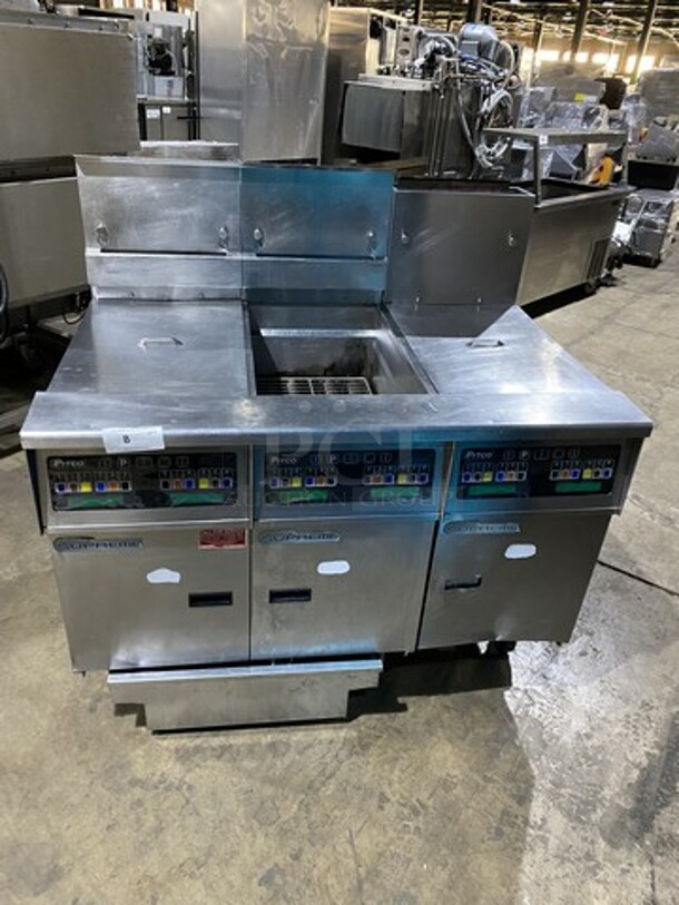 Wow! Pitco Soltice Supreme Natural Gas Powered 3 Bay Deep Fat Fryer! With Digital Control Board! With Oil Filter System! Model SS1460 Serial G13L0061464! With Night Covers! On Casters! 