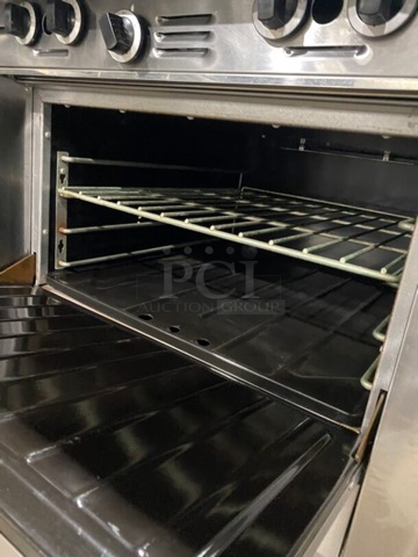 Garland Commercial Natural Gas Powered 4 Burner Stove! With Back Splash! With Oven Underneath! Metal Oven Rack! All Stainless Steel! On Casters! Model: M44R SN: 1601100100589 - Image 7 of 10