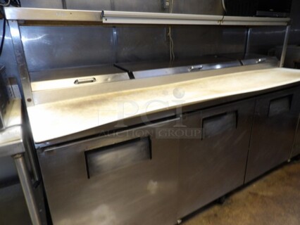 True 3-Door Stainless Pizza/Sandwich Prep Table W/Overhead Shelf. 
TESTED AND WORKING
Model TPP-93
Single Phase