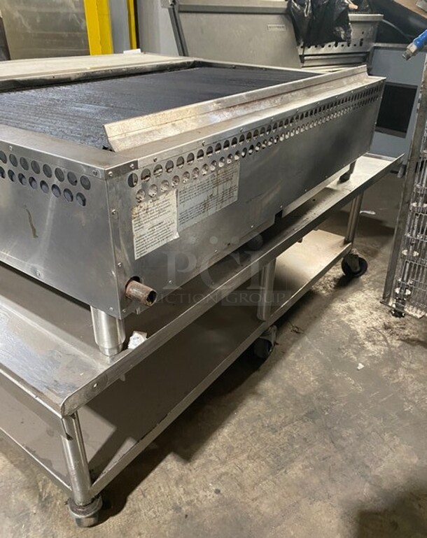 Bakers Pride Commercial Countertop Natural Gas Powered 48 Inch Char Broiler Grill! On Commercial 60 Inch Equipment Stand! With Underneath Storage Space! All Stainless Steel! On Casters! Working When Removed! Model XX8 Serial 592381707002! - Image 3 of 10