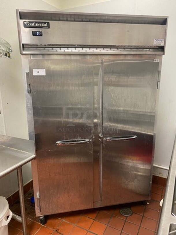 Continental Commercial 2 Door Reach In Freezer! With Poly Coated Racks! All Stainless Steel! On Casters! WORKING WHEN REMOVED! Model: 2FS SN: 15844126 115V 60HZ 1 Phase