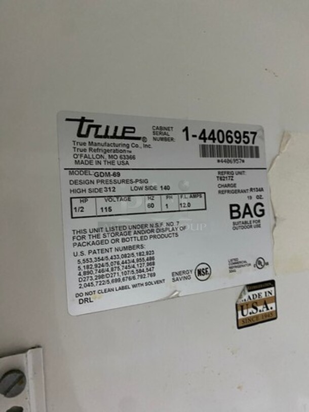 TRUE 3-Glass Sliding Door Merchandiser Refrigerator W/ Poly Coated Racks! 
Model GDM-69 Serial 1-4406957 115V/60Hz/ 1 Phase - Image 7 of 8
