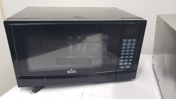 Rival 0.9 Cu. Ft. Black Microwave Oven

Not tested

(Location 2) - Image 1 of 3
