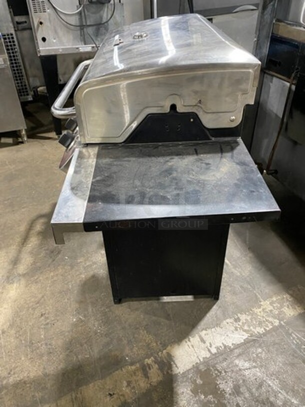 AWESOME! Char Broil Gas Powered Outdoor 6 Burner BBQ Grill! With Left Side Single Burner! Right Side Table! Hinged Lid! With Cabinet Storage Space Underneath! - Image 2 of 10