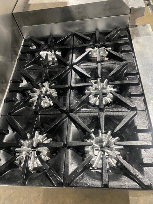 BEAUTIFUL! Garland Commercial Natural Gas Powered 6 Burner Stove With Raised Right Side Flat Griddle & Cheese Melter! Griddle Has Side Splashes! With Raised Back Splash And Salamander Shelf! With 2 Full Size Ovens Underneath! With Metal Oven Racks! All Stainless Steel! On Casters! - Image 5 of 9