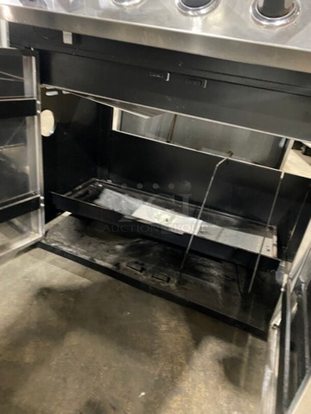 AWESOME! Char Broil Gas Powered Outdoor 6 Burner BBQ Grill! With Left Side Single Burner! Right Side Table! Hinged Lid! With Cabinet Storage Space Underneath! - Image 7 of 10
