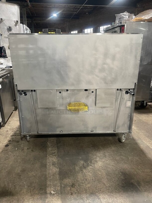 AMAZING! Garland Natural Gas Powered 10 Burner Stove! With 2 Standard Ovens Underneath! With Back Splash & Overhead Salamander Shelf! All Stainless Steel! On Casters! Model: G60-10RR! - Image 4 of 10