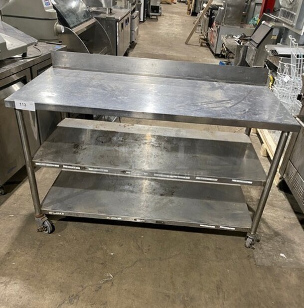 Stainless Steel Worktable With Back Splash And Double Undershelf! On Casters! - Image 1 of 7