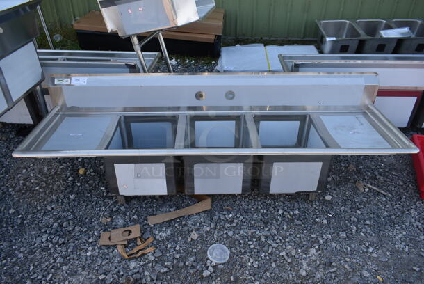 BRAND NEW SCRATCH AND DENT! Regency 600S31620218 Stainless Steel Commercial 3 Bay Sink w/ Dual Drain Boards. No Legs. Bays 16x20. Drain Boards 16.5x22 - Image 1 of 5