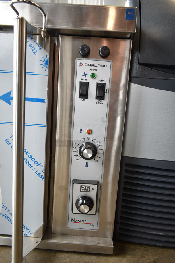 BRAND NEW SCRATCH AND DENT! 2022 Garland MCO-E-5-C Stainless Steel Commercial Electric Powered Half Size Convection Oven w/ View Through Door, Metal Oven Racks and Thermostatic Controls. 208 Volts, 3 Phase.  - Image 3 of 7