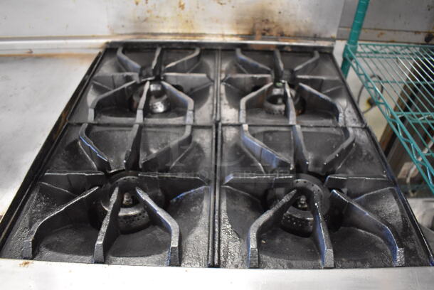 Imperial Stainless Steel Commercial Natural Gas Powered 4 Burner Range, Flat Top Griddle, Oven, Over Shelf and Back Splash on Commercial Casters. 60x31x57
 - Image 7 of 10