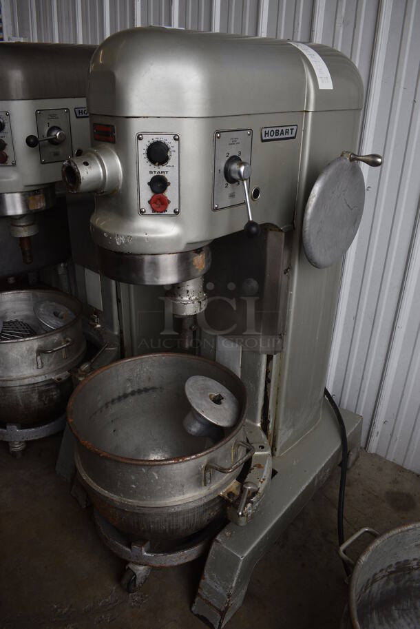 Hobart Model H 600T Metal Commercial Floor Style 60 Quart Planetary Mixer w/ Metal Mixing Bowl, Mixing Bowl Dolly and Dough Hook Attachment. 230 Volts, 1 Phase. 29x43x56