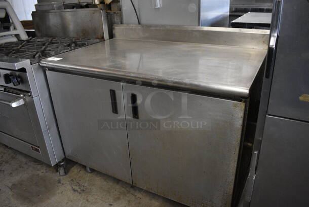 Advance Tabco Stainless Steel Commercial Counter w/ Back Splash, 2 Doors and Under Shelves on Commercial Casters. 48x30x40 - Image 3 of 5