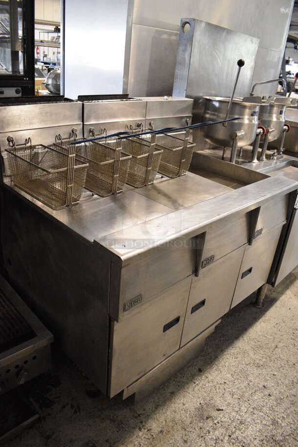 Pitco Frialator SG14-JS Stainless Steel Commercial Natural Gas Powered Floor Style 2 Bay Deep Fat Fryer w/ Right Side Pitco Frialator SGBNB14-0 Dumping Station, 4 Metal Fry Baskets and 2 Lids on Commercial Casters. 122,000 BTU. 47x35x46 - Image 11 of 12
