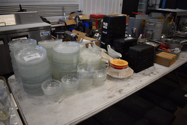 ALL ONE MONEY! Lot of Items on Tabletop Including Glass Salad Plates, Ceramic Gravy Boats, Poly Drop In Bins and Metal Sauce Pans. - Image 1 of 8