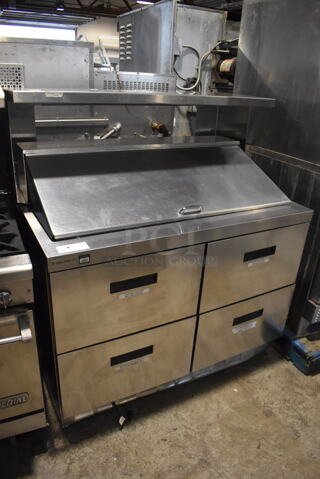 2018 Model Delfield D4448N-18M Commercial Stainless Steel Electric Powered 4 Drawer Mega Top Front Breathing Refrigerated Sandwich Prep Table On Commercial Casters. 115V/1 Phase Tested And Working!