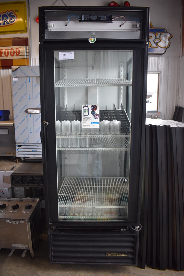2011 True GEM-26 Metal Commercial Single Door Reach In Cooler Merchandiser w/ Poly Coated Racks on Commercial Casters. 115 Volts, 1 Phase. 30x31x82. Tested and Working!