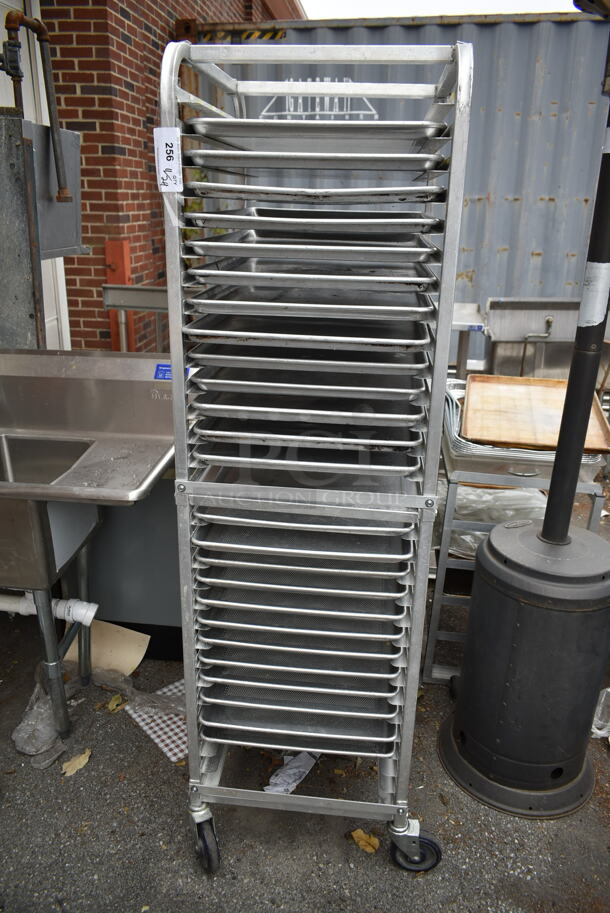 Metal Commercial Pan Transport Rack w/ 25 Baking Pans on Commercial Casters. - Image 1 of 2