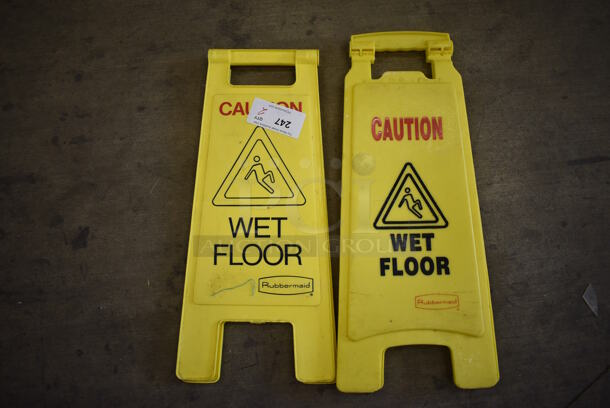 2 Yellow Poly Wet Floor Caution Signs. 11x1x24. 2 Times Your Bid!