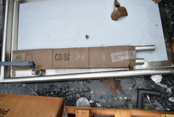 BRAND NEW SCRATCH AND DENT! Regency 600CDT48L 24" x 30" 16-Gauge 304 Stainless Steel Commercial Open Base Work Table - Image 3 of 4