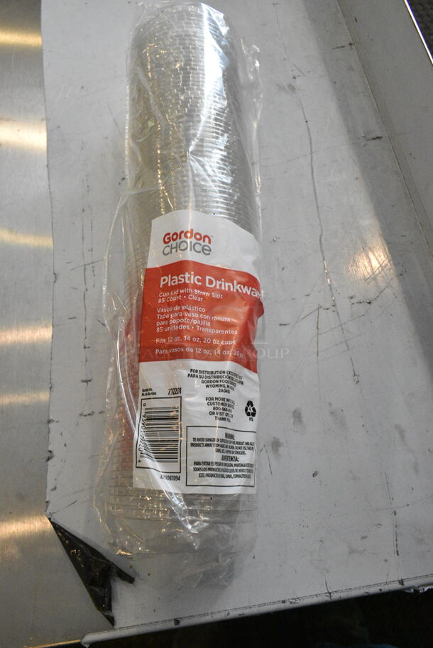 Chrome Finish 3 Tier Wire Shelving Unit w/ Contents Including Cups, Straws and Lids. BUYER MUST DISMANTLE. PCI CANNOT DISMANTLE FOR SHIPPING. PLEASE CONSIDER FREIGHT CHARGES. (secondary dining room) - Image 2 of 11