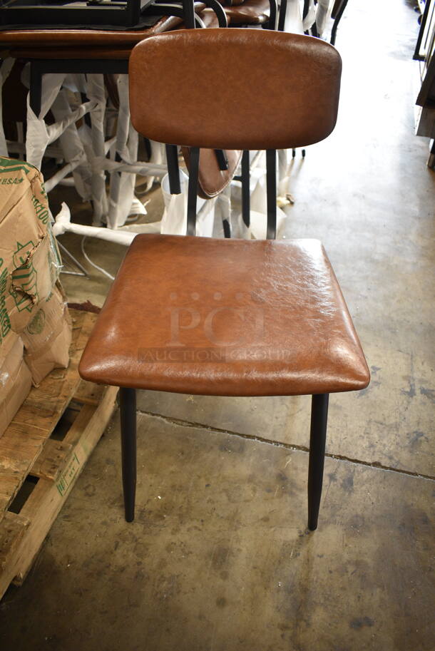 19 BRAND NEW SCRATCH AND DENT! Lancaster Table & Seating Mid-Century Black Chair with Cognac Vinyl Padded Seat and Backrest; 6 164CMCMCCCB Dining Height and 13 164MCMCGRST Bar Height. 19 Times Your Bid!  - Image 3 of 6