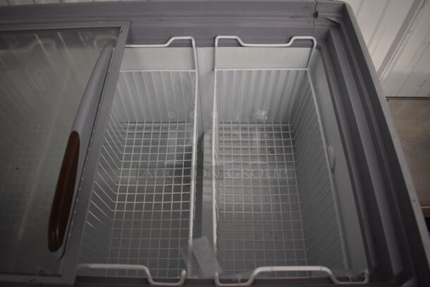Avantco Metal Commercial Chest Freezer Merchandiser w/ Poly Coated Baskets on Commercial Casters. 71x28x34. Tested and Powers On But Does Not Get Cold - Image 4 of 8
