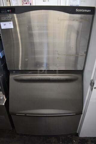 Scotsman Prodigy Model C0630SA-32B Stainless Steel Commercial Air Cooled Ice Machine Head on Commercial Ice Bin. 208/230 Volts, 1 Phase. 30x33x61.
