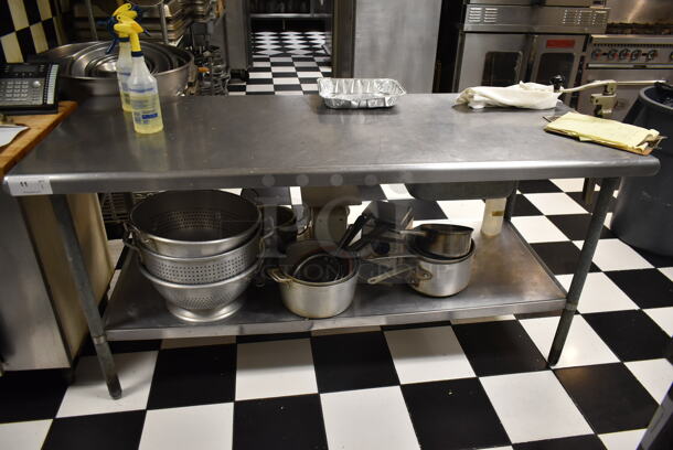 Stainless Steel Commercial Table w/ Mounted Commercial Can Opener and Under Shelf. (kitchen)  - Image 1 of 6