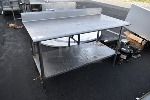 Stainless Steel Commercial Table w/ Back Splash and Under Shelf.