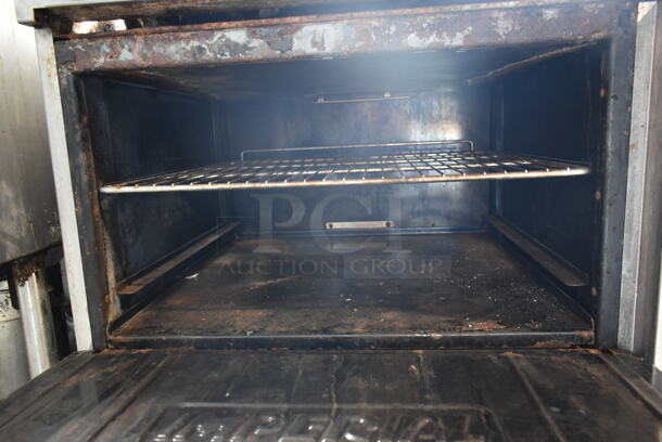 Imperial IR-6 Stainless Steel Commercial Natural Gas Powered 6 Burner Range w/ Oven and Back Splash on Commercial Casters.  - Image 4 of 7