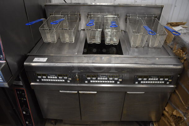 2010 Frymaster Model BIGLA330CSD Stainless Steel Commercial Floor Style Natural Gas Powered 3 Bay Deep Fat Fryer w/ 6 NEW Metal Fry Baskets and 2 Lids on Commercial Casters. 75,000 BTU. 48x33x48.5 - Image 1 of 11