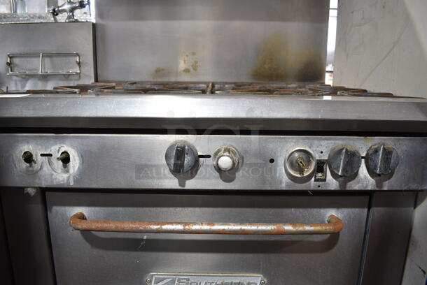 Southbend Stainless Steel Commercial Natural Gas Powered 6 Burner Range w/ Oven, Over Shelf and Back Splash on Commercial Casters.  - Image 3 of 9