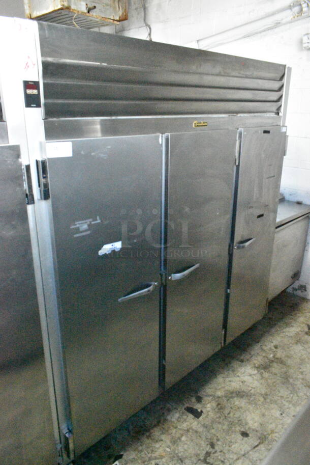 Traulsen G31010JC ENERGY STAR Stainless Steel Commercial 3 Door Reach In Freezer on Commercial Casters. 115 Volts, 1 Phase. Tested and Powers On But Does Not Get Cold - Image 1 of 7