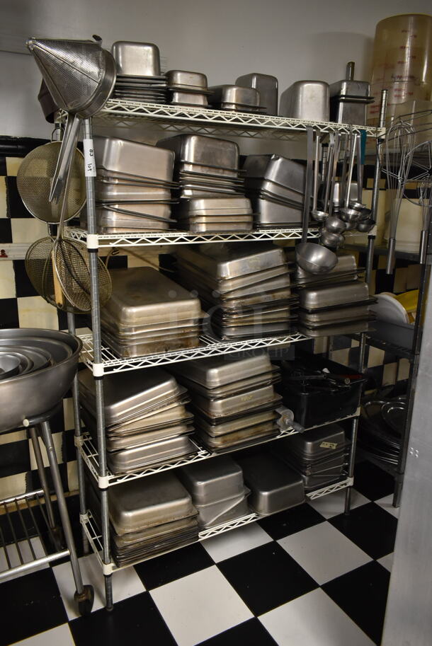White and Chrome Finish 5 Tier Wire Shelving Unit w/ Contents Including Stainless Steel Drop In Bins. BUYER MUST REMOVE: BUYER MUST DISMANTLE. PCI CANNOT DISMANTLE FOR SHIPPING. PLEASE CONSIDER FREIGHT CHARGES. (kitchen) - Image 1 of 6