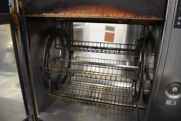 Fri-jado STG7-P Stainless Steel Commercial Electric Powered 5 Spit Rotisserie Oven on Commercial Casters w/ 5 Metal Basket Spits. 208 Volts, 3 Phase. 41x34x71 - Image 7 of 12