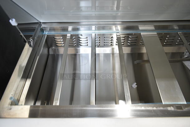 BRAND NEW SCRATCH AND DENT! 2023 Avantco 178SSPT60MHC  60" 2 Door Mega Top Stainless Steel Refrigerated Sandwich Prep Table on Commercial Casters. 115 Volts, 1 Phase. Tested and Working! - Image 6 of 9