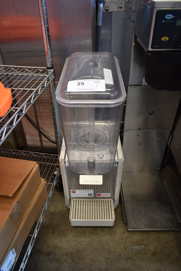 2021 Crathco D15-4 Stainless Steel Commercial Countertop Single Hopper Refrigerated Beverage Machine. 115 Volts, 1 Phase. Tested and Powers On But Does Not Get Cold