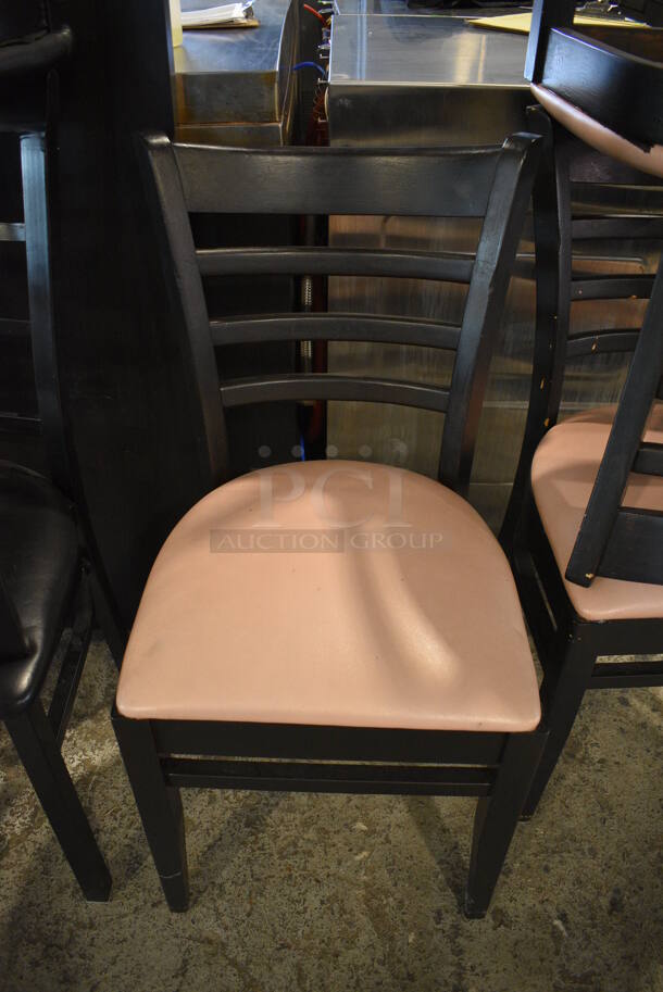 4 Wood Pattern Black Dining Chairs w/ Pink Seat Cushion. 17x17x34. 4 Times Your Bid!