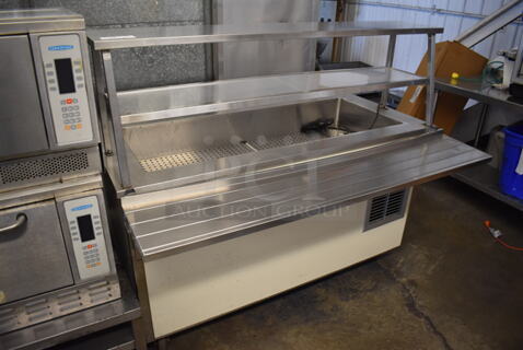 Vollrath 37065-460-DNA Stainless Steel Commercial Buffett Station w/ Tray Slide and Sneeze Guard on Commercial Casters. 120 Volts, 1 Phase. 60x48x52. Cannot Test Due To Plug Style