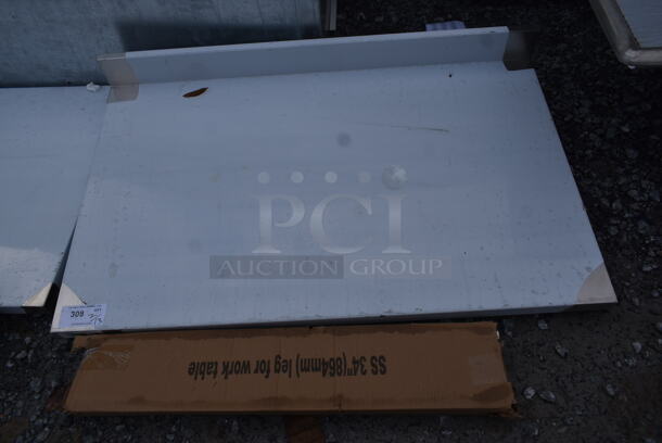 BRAND NEW SCRATCH AND DENT! Regency 600TSB3048S 30" x 48" 16-Gauge Stainless Steel Commercial Work Table with 4" Backsplash and Undershelf - Image 2 of 5