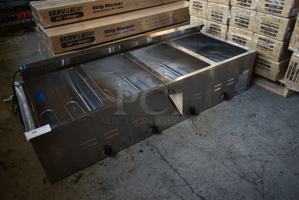 BRAND NEW SCRATCH AND DENT! Avantco 177STE4SA Stainless Steel Commercial 4 Bay Steam Table. No Legs. 120 Volts, 1 Phase. Cannot Test Due To Plug Style